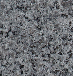 Finoman csiszolt felületű G 654 közép-szürke színű diorit